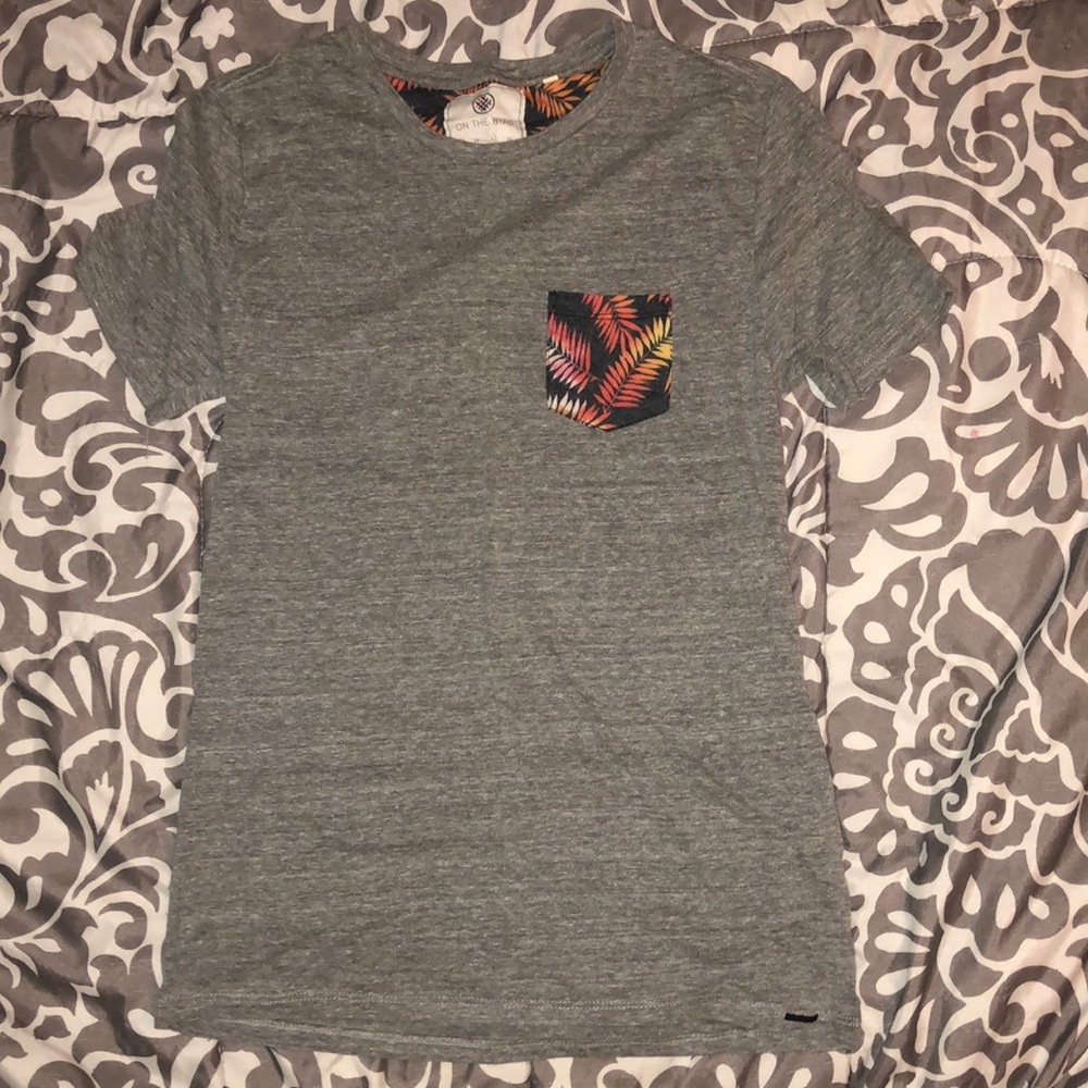 On the Byas PacSun men’s T-shirt with pocket
